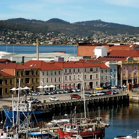The Henry Jones Art Hotel Hobart Exterior photo The battery, with the city in the background