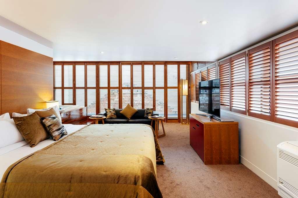 The Henry Jones Art Hotel Hobart Room photo A bedroom at the hotel