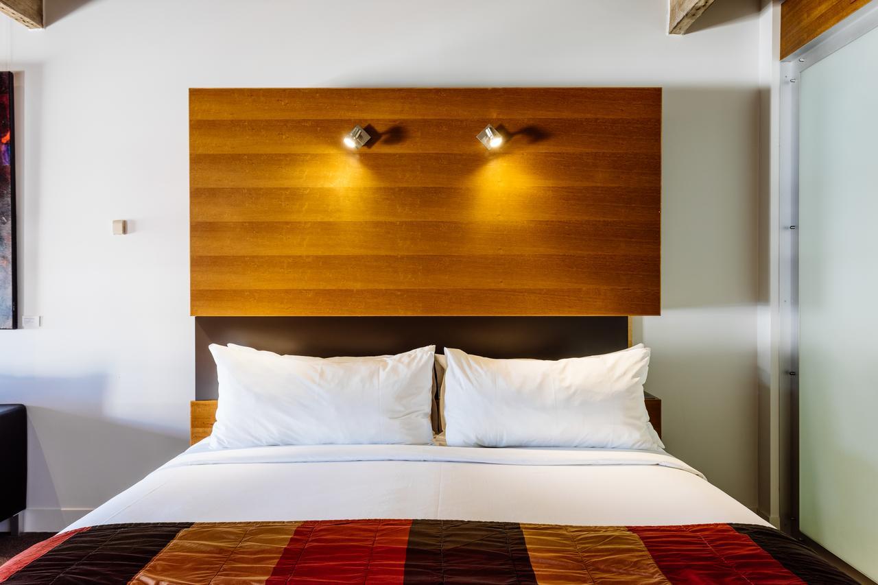 The Henry Jones Art Hotel Hobart Exterior photo A bed with two pillows