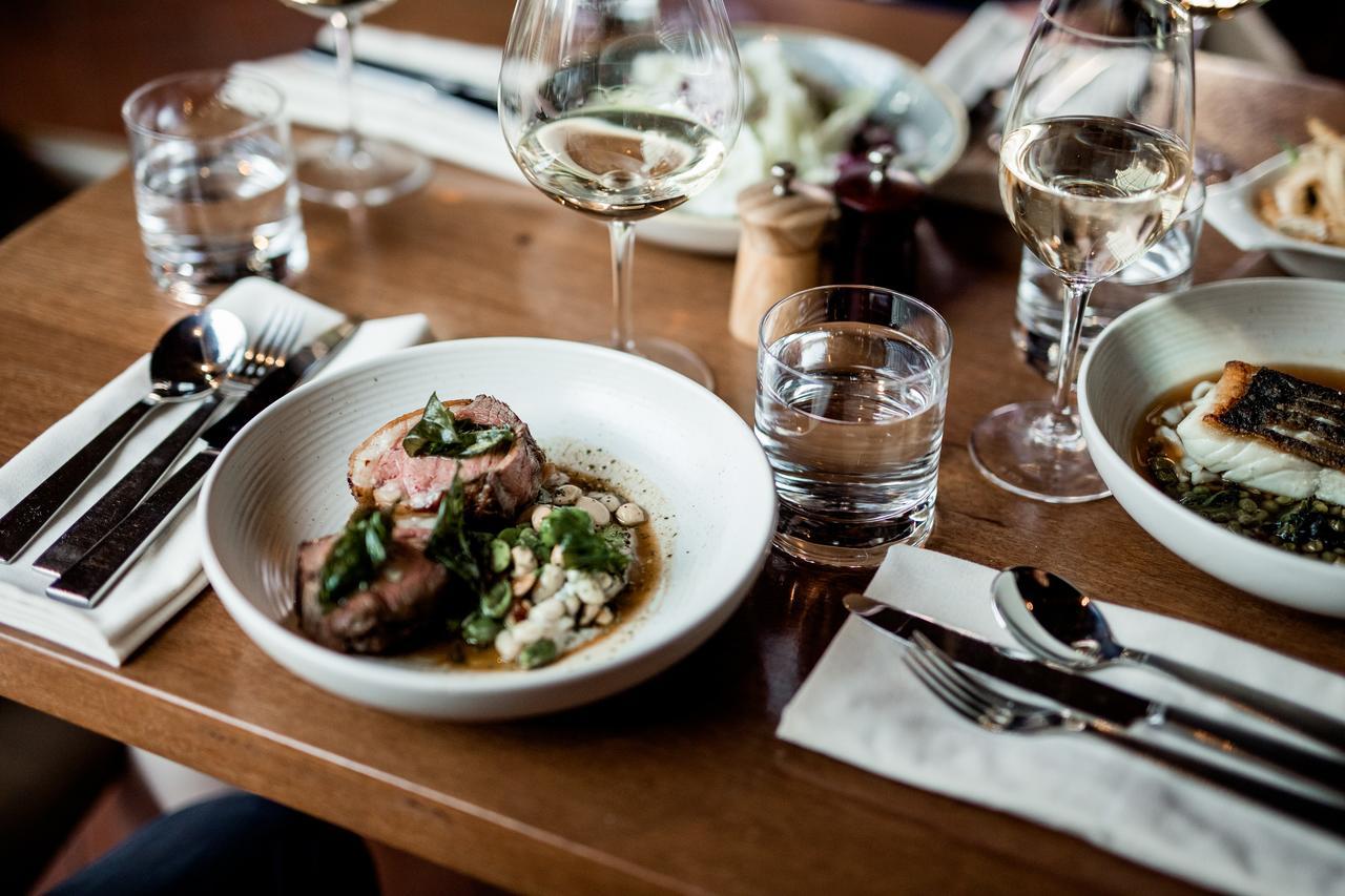 The Henry Jones Art Hotel Hobart Exterior photo Dishes at the restaurant