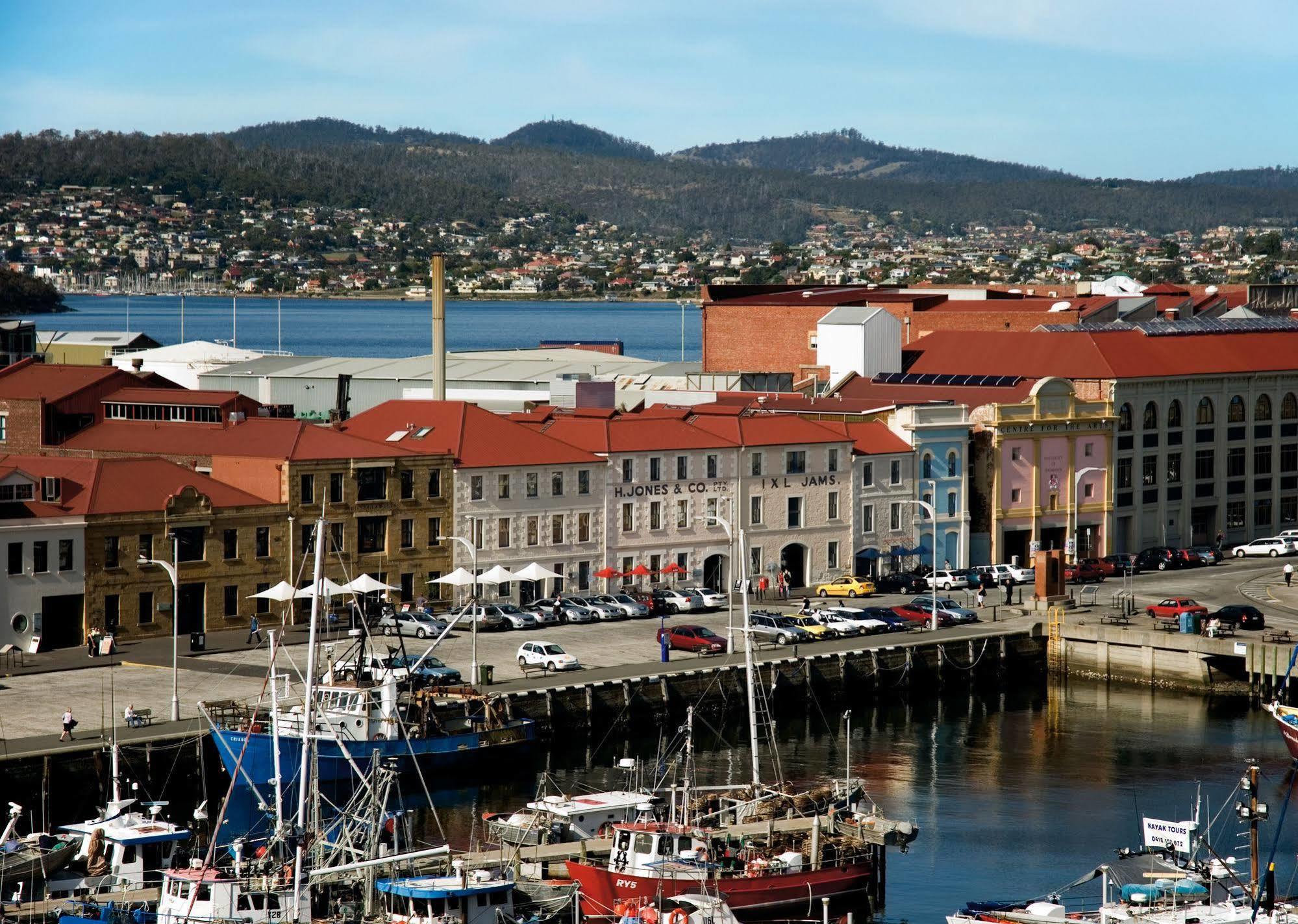 The Henry Jones Art Hotel Hobart Exterior photo The battery, with the city in the background